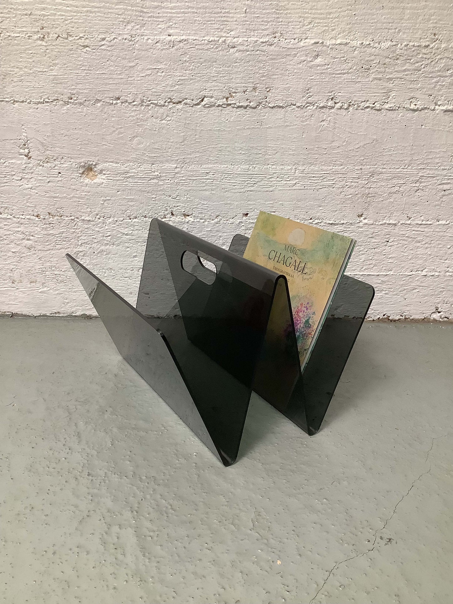 Akryylinen lehtiteline, 80-luku