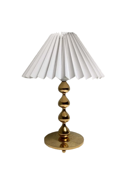 Tanskalainen Hugo Asmussen kullattu pöytävalaisin