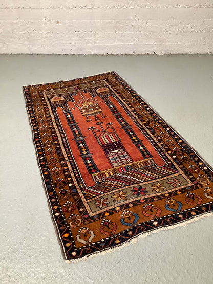 Käsinsolmittu villamatto