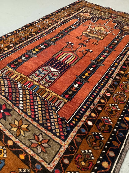 Käsinsolmittu villamatto