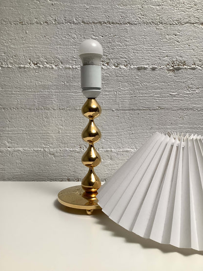 Tanskalainen Hugo Asmussen kullattu pöytävalaisin